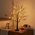 Árbol de flores de bayas rojas